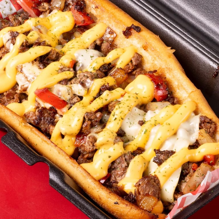 Indulge in Our Cheesesteak